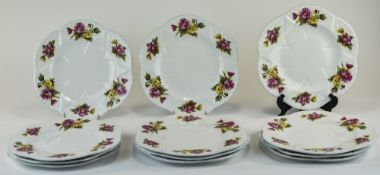 Shelley 1940's Set Of 12 Shaped Plates, ''Begonia'' pattern, number 13427. Yellow and pink flowers