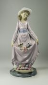 Lladro Figure ' Flower Curtesy ' Model Num 5027. Issued 1979. Height 9.75 Inches.