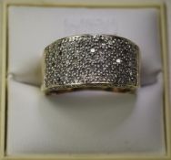 A 9ct Gold Set Diamond Cluster Ring. Fully Hallmarked and Set with Over 1ct of Diamonds.