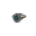 18ct White Gold Diamond And Emerald Cluster Ring Central Oval Emerald Surrounded By Alternating