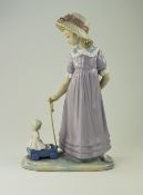 Lladro Figure - Girl with Toy Wagon, Model Num 5044. Issued 1980 - 1997. Height 11 Inches.