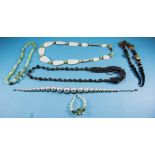 Three Various Costume Necklaces comprising an Art Nouveau style, faux moonstone, floral, pendant