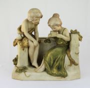 Royal Dux Group Figure of a Boy and Girl Seated, The Girl Playing a Musical Instrument. c.1900. Pink