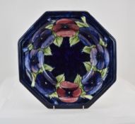 William Moorcroft Large Octagonal Shaped Bowl, with ' Pansy ' Design on Blue Ground. c.1920 - 1930.