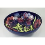 Walter Moorcroft Large Tube lined Footed Bowl ' Clematis ' Design on Blue Ground. c.1990's. 3.