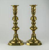 A Victorian Pair of Brass Candlesticks. Each 10.5 Inches High.