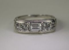 18ct White Gold Diamond Ring Set With A Central Baguette Between 2 Round Brilliant Cut Diamonds,