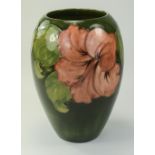Moorcroft Ovoid Shaped Vase ' Coral Hibiscus ' Design on Green Ground.