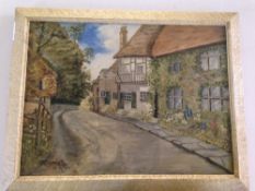 Framed Oil On Canvas Depicting A Village Street Scene With Cottages,