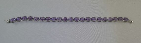 A Silver Set and Mounted Amethyst Bracelet, The 21 Amethysts of Pale Colour and Good Clarity,