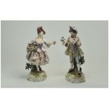 German Hand Painted Porcelain Early 20th Century Pair of Figures In 18th Century Dress.