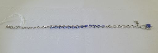 Lavender Tanzanite Line Bracelet with Charm, a row of the spring purplish blue tanzanite, 2.