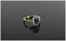 18ct Gold Set Diamond and Sapphire Cluster Ring. Marked 18ct. 4 grams.