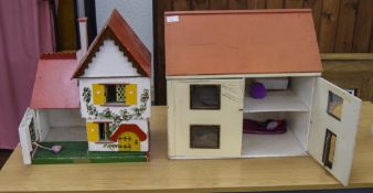 Two Early To Mid 20th Century Wooden Dolls Houses. The Largest 19 Inches High, 20 x 14 Inches.
