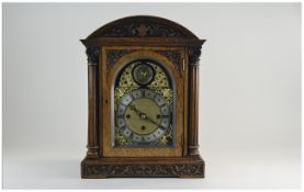 English Late 19th Century Oak Cased Mantel Clock with Striking and Chiming 8 Day Movement,