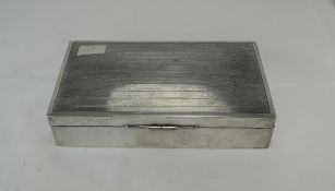 A Silver Table Cigarette Box of Rectangle Shape with Engine Turned Top. Hallmark Chester 1927.