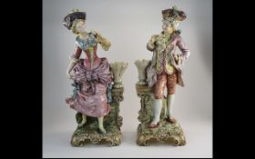 Pair Of Large 19thC Brothers Urbach Majolica Figures Depicting A Lady And Gent in 18thC Attire;