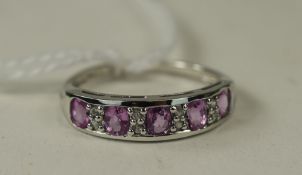 Pink Sapphire and White Zircon Band Ring, in 9ct white gold, having five oval cut pink sapphires,
