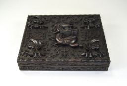 A Chinese Carved ' Indian Rosewood ' Box with Raised Carved Dragon and Symbols. 10.3/4 x 9 x 2.