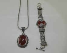 Late 20th Century Ethnic Excellent Quality and Heavy Silver Weaved Ornate Red Agate Set Bracelet.