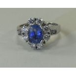 Ladies Fine Quality 18ct White Gold Set Sapphire and Diamond Cluster Ring.