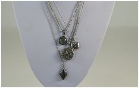 A Collection of Silver and Stone Set Jewellery, Comprises Six Pendants and Lockets,