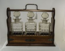 Early 20thC Oak Framed Tantalus, 3 Sectional Lockable Compartment With 3 Decanters, Odd Chips,