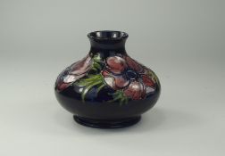 Moorcroft - Tubelined Squat Shaped Footed Vase ' Clematis ' Design on Blue Ground. c.1950's. 4.