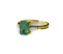 18ct Gold Emerald And Diamond Ring Set With Central Emerald Between Two Baguette Cut Diamonds,