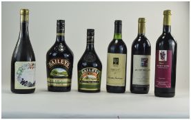 4 Bottles Of Wine Together With 1L And 700ml Bottles Of Baileys