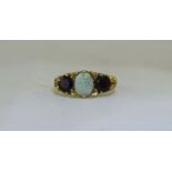 A Ladies - Nice Quality 9ct Gold Set Opal and Sapphire Dress Ring. Fully Hallmarked. 4.6 grams.