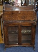 Arts And Crafts Style Oak Book Case Single Shelf Above A Fitted Fall Front Above 2 Glazed Doors