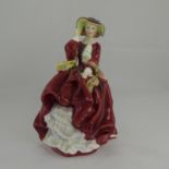 Royal Doulton Early Figurine ' Top O' The Hill ' HN1834. Designer L. Harradine, Colour Red.