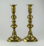 A Victorian Pair of Brass Candlesticks.