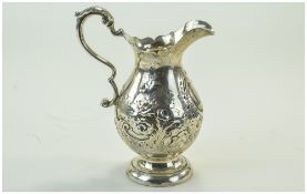 Victorian Silver Floral Embossed Cream Jug, Shaped Edge, Scroll Handle With Acanthus Leaf Cap,