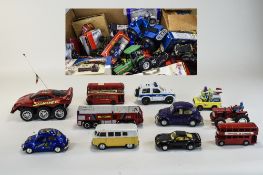 A Large Box Containing Diecast Model Cars, Buses, Trucks etc. Various Sizes and Makers.