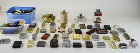 A Large Collection of Petrol and Gas Lighters, Various Makers, Sizes and Styles.