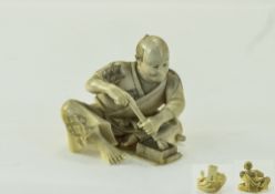 Japanese Late 19th Finely Carved Ivory Figure of a Japanese Man Making Bricks.
