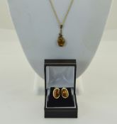 9ct Gold Amber Set Pendant And Earrings Suspended on A 9ct Gold Fine Link Chain,