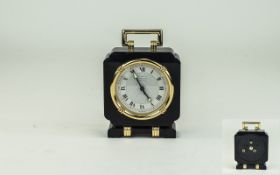 A Fine Quality Contemporary Cartier Desk Clock, Black Onyx and Gold Tone Style with Alarm Clock.