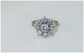 White Gold Diamond Cluster Ring Set With Nine Round Modern Brilliant Cut Diamonds In A Flower Head