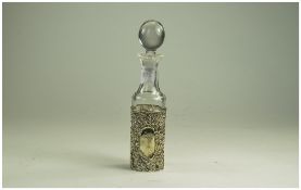 Edwardian Glass Vinegar Bottle And Stopper With Silver Holder Decorated With Floral Pierced Design,
