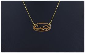 18ct Gold Pendant and Attached Chain. Marked 18ct. 17 Inches In Length. 5.6 grams.