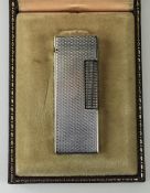 Dunhill Silver Cased Gas Lighter with Original Box. U.S. Reg 24153. 2.5 Inches High.