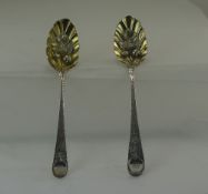 William IV Silver Pair of Fine Chased and Embossed Decoration Preserve Table Spoons with Gilt Fruit