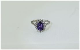 18ct White Gold Set Amethyst and Diamond Cluster Ring.