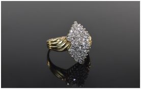 14ct Gold Marquise Shaped Heavy and Impressive Pave Set Diamond Cluster Ring.