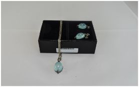 A Silver Necklace and Pendant Drop with