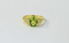 Peridot Oval Cut Ring, a 2,75ct oval cut peridot of excellent colour,