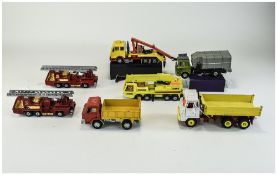 A Collection of Vintage Dinky and Matchbox Scale Diecast Model Trucks, Fire Engines,